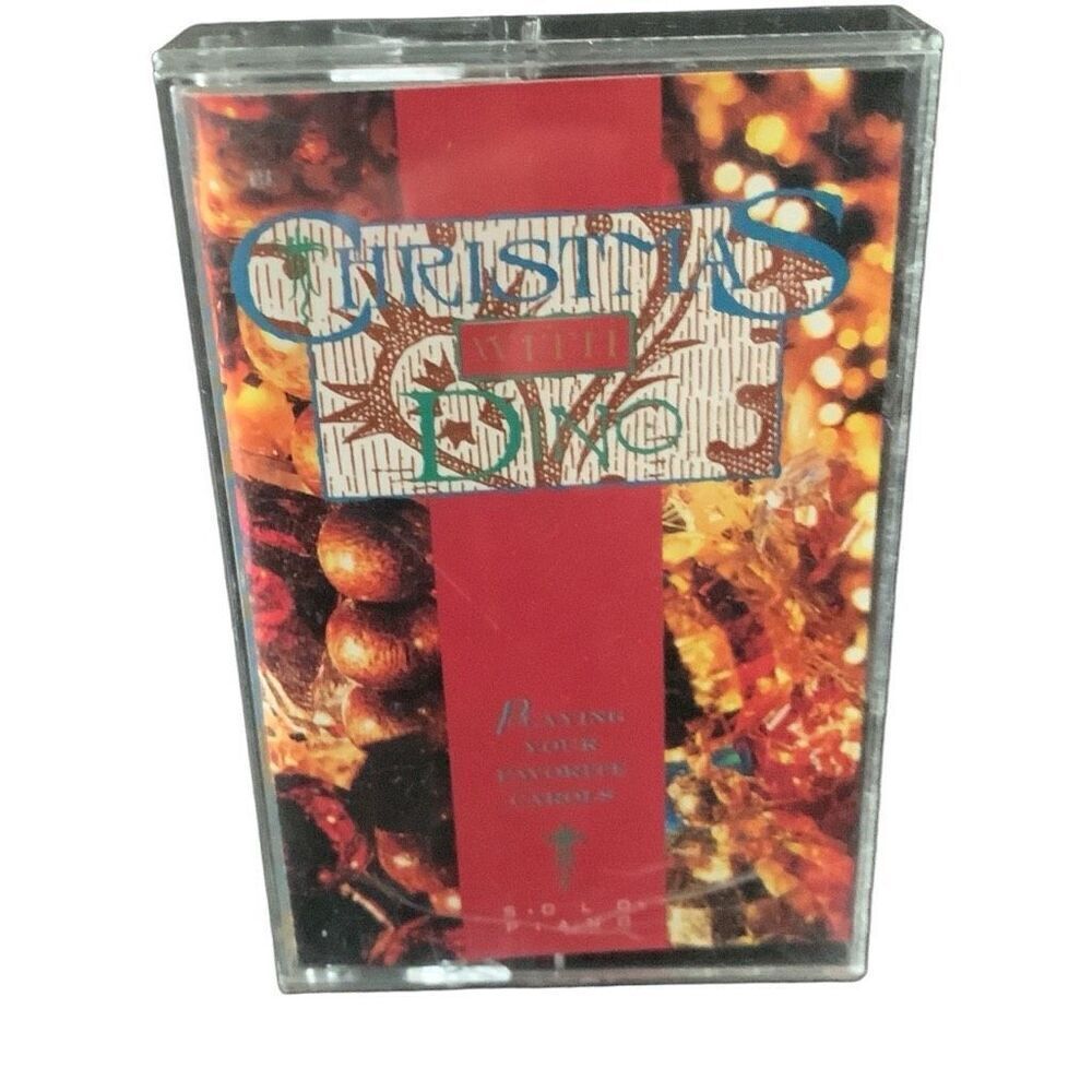 Pre Owned Music Cassette Christmas with Dino Playing your Favorite Carols